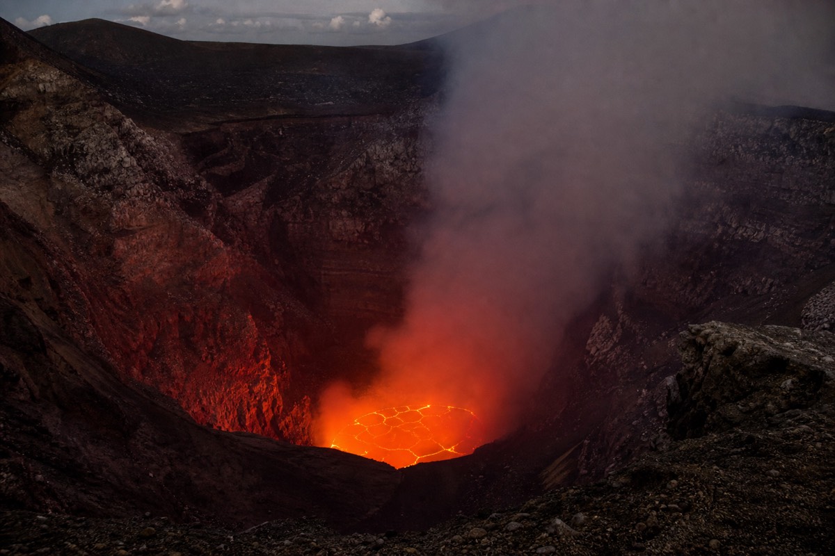 The glowing lava lake inside Santiago Crater